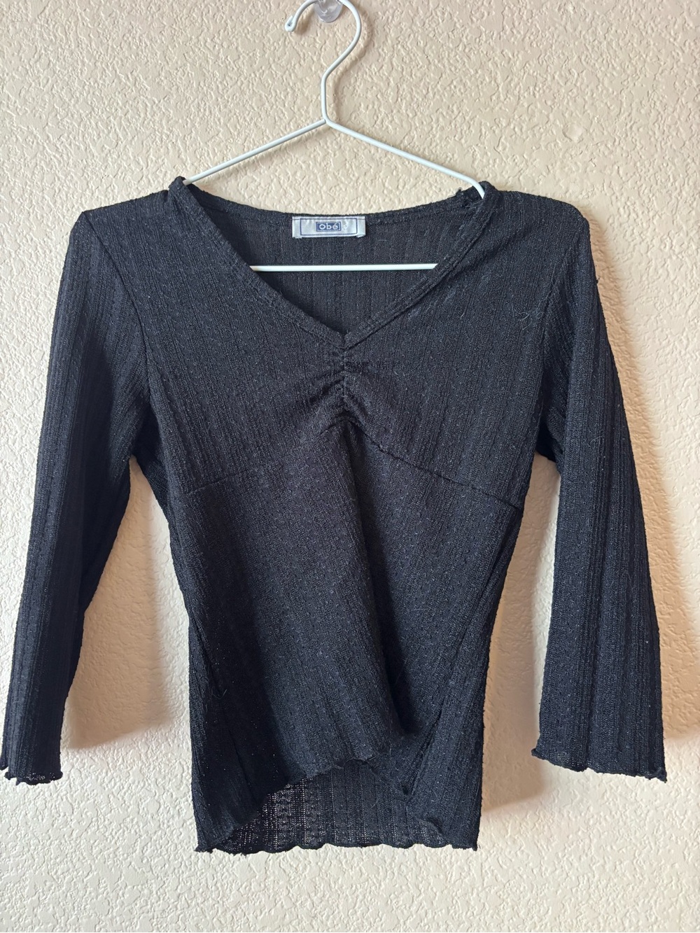Obé Black Ribbed V-Neck Ruched Long Sleeve Top